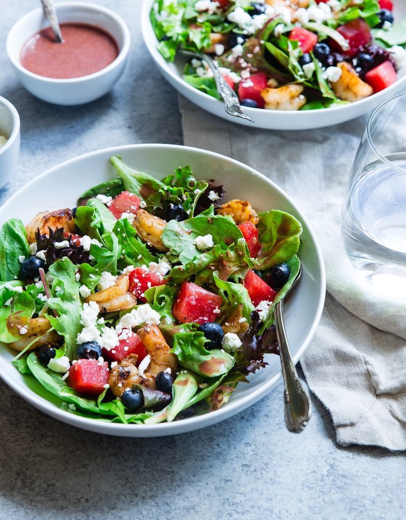 vegetable salad on white ceramic bowl